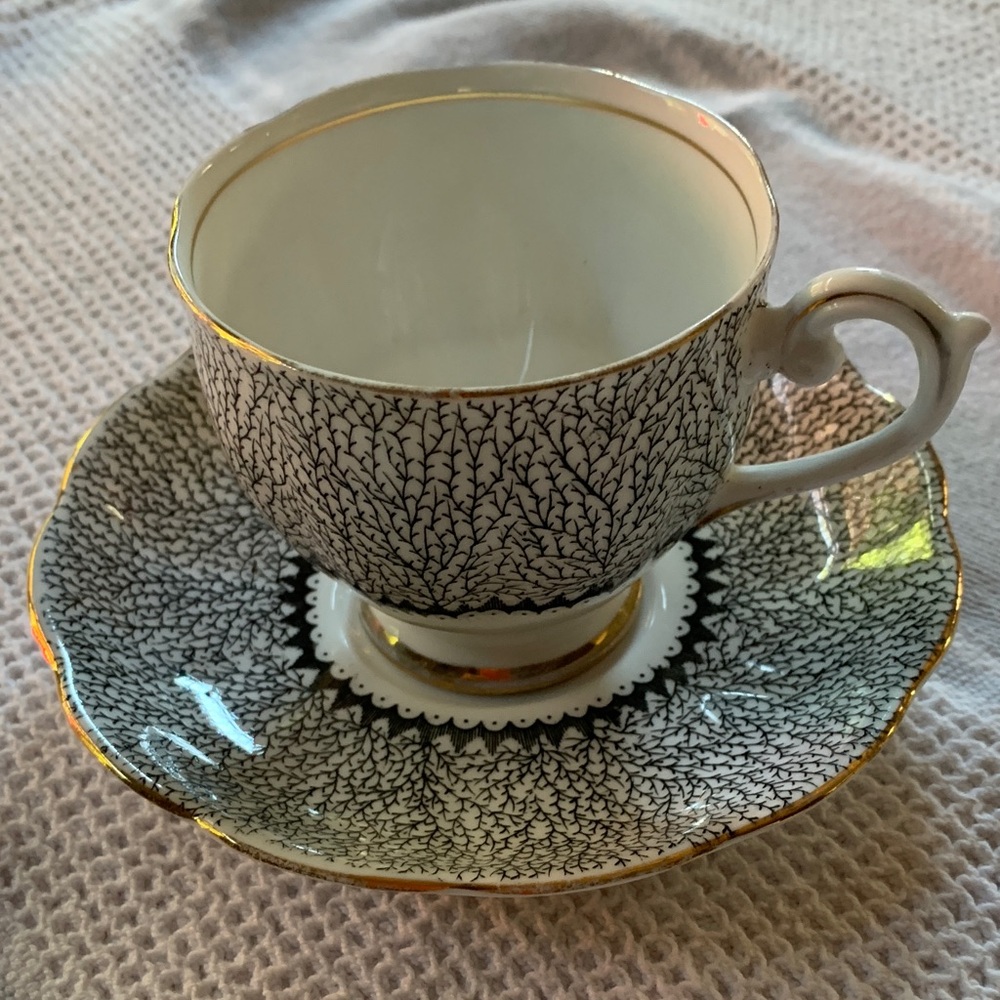 Teacup and saucer. Bell fine China from England Black and white design. Vintage